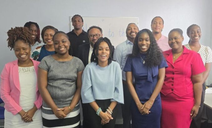 Erika-Watson-and-interns-from-Bryden-Stokes-Limited-Summer-Internship-Programme- Programme Manager, Ministry of Labour, Social Security and the Third Sector, Erika Watson (second row, third from left); General Manager Bryden Stokes Ltd (BSL). David Sealy (second row, centre); Sabrina Wiggins (left) and Programme Officer, Imran Best (fifth from right) pose for a photograph with interns from the BSL Summer Internship Programme for 2026. (P. Harper-Grant|BGIS)
