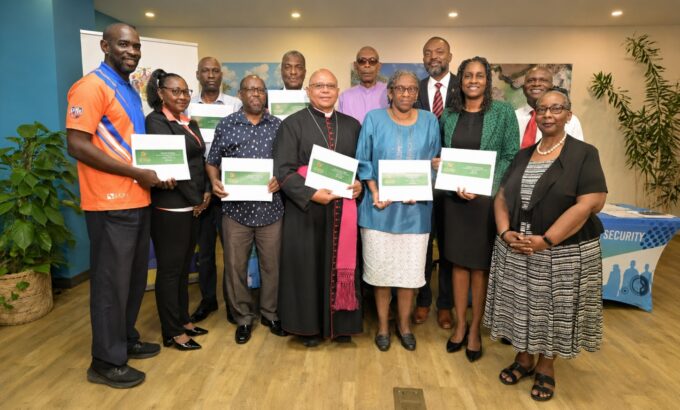 Formal group portrait with certificates